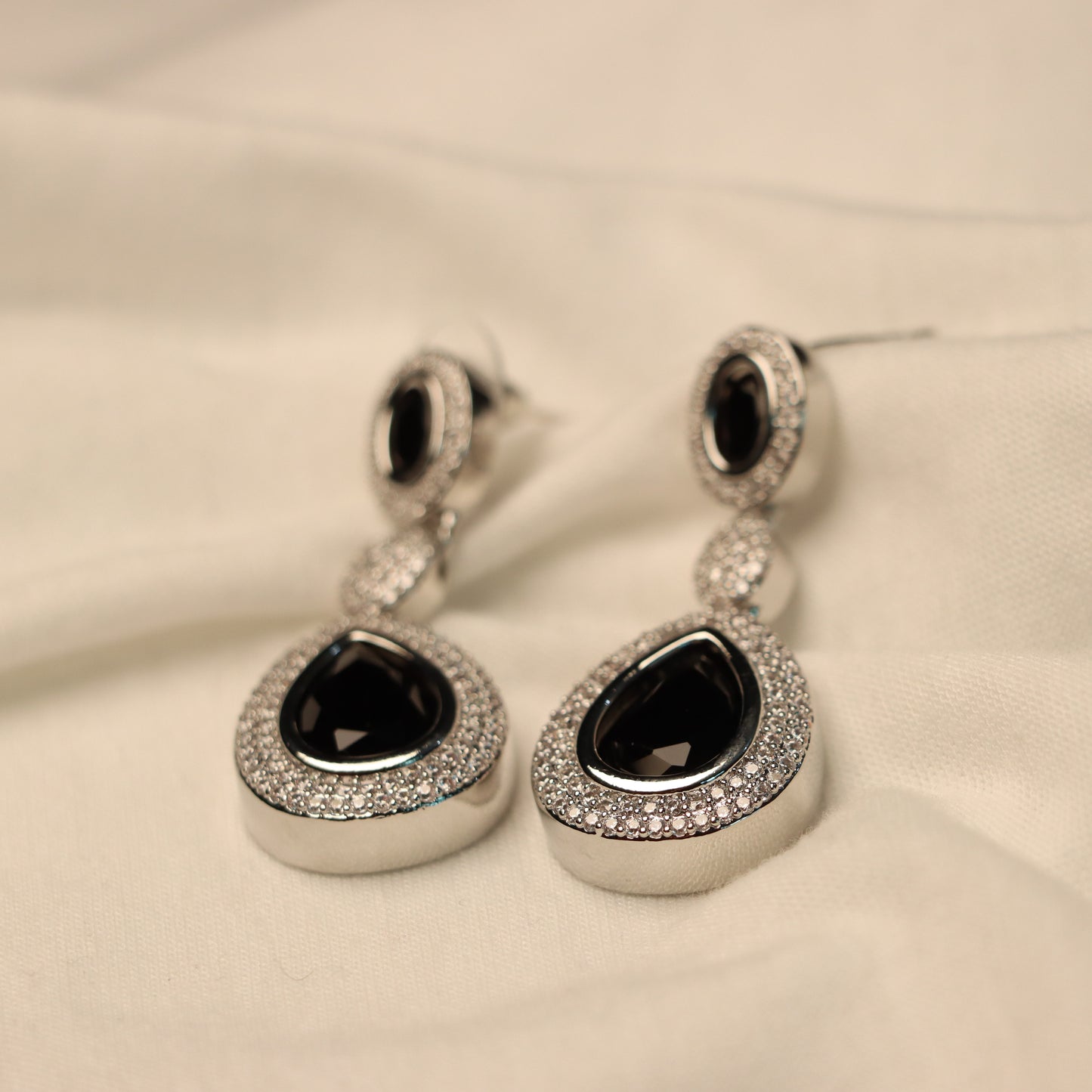 Black Teardrop Silver Border Dangle Earrings