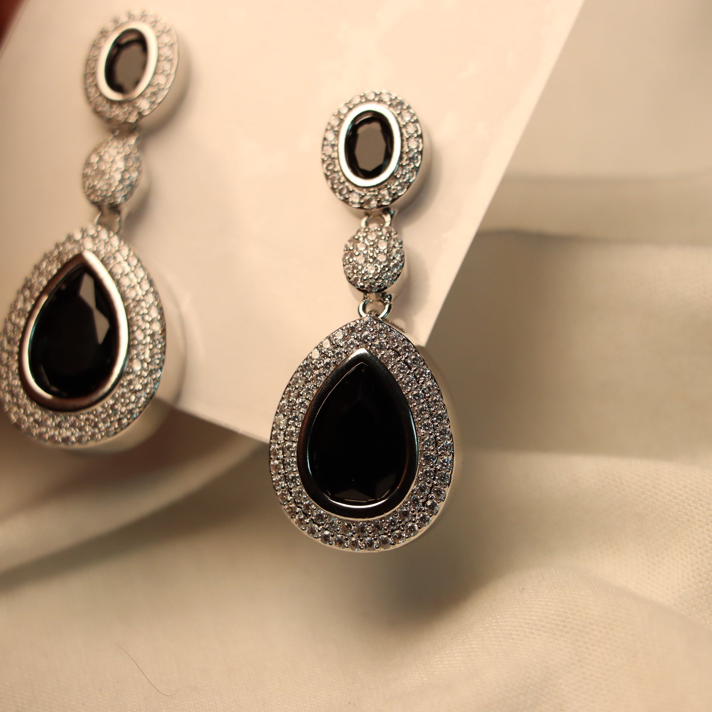 Black Teardrop Silver Border Dangle Earrings